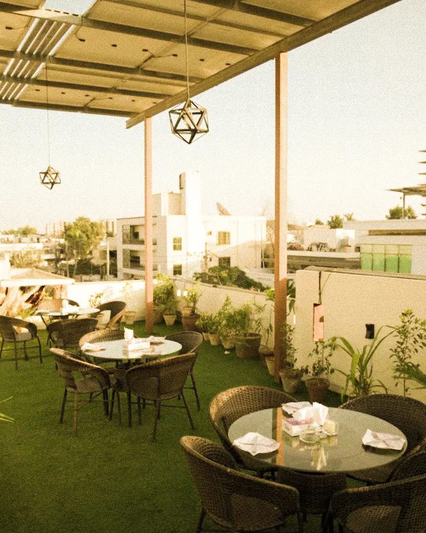 elet signature rooftop terrace at dusk overlooking clifton